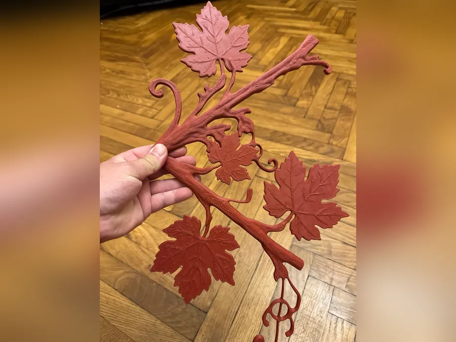 Grapevine for a wedding photo-zone arch: a vine segment after printing, before painting
